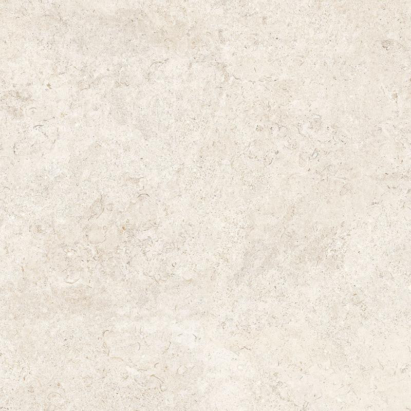 Baldosa de porcelana Coquina Blanco Roto 32x32 con aspecto de piedra shellstone