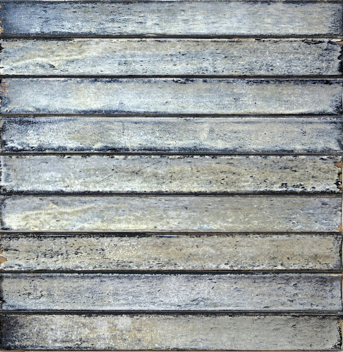Delta Sky Glossy 5x13 ceramic tile shown in a multi-piece layout in blue-grey tones