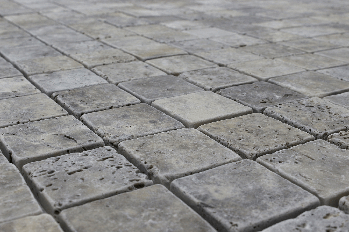 Close up of our Square Silver Travertine Tumbled Mosaic Tile