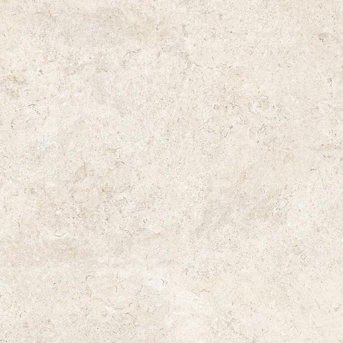 Baldosa de porcelana Coquina Blanco Roto 32x32 con aspecto de piedra shellstone 1
