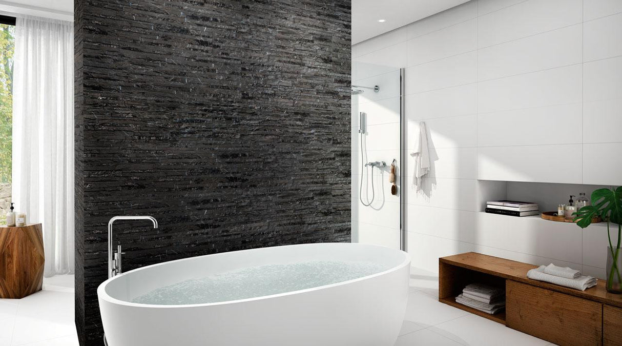 Modern bathroom with a freestanding bathtub, wooden shelf, and Thuy Marquina Porcelain Wall Tile