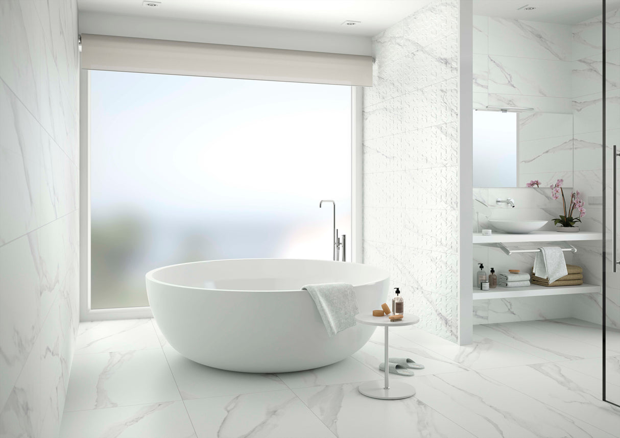 Updated bath with Spanish porcelain tile floor and freestanding tub.