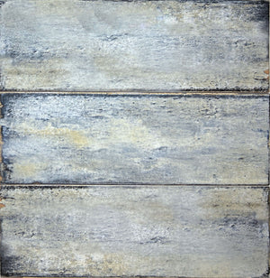Delta Sky Glossy 5x13 ceramic tile, close-up of three pieces in a blue-grey glossy glaze