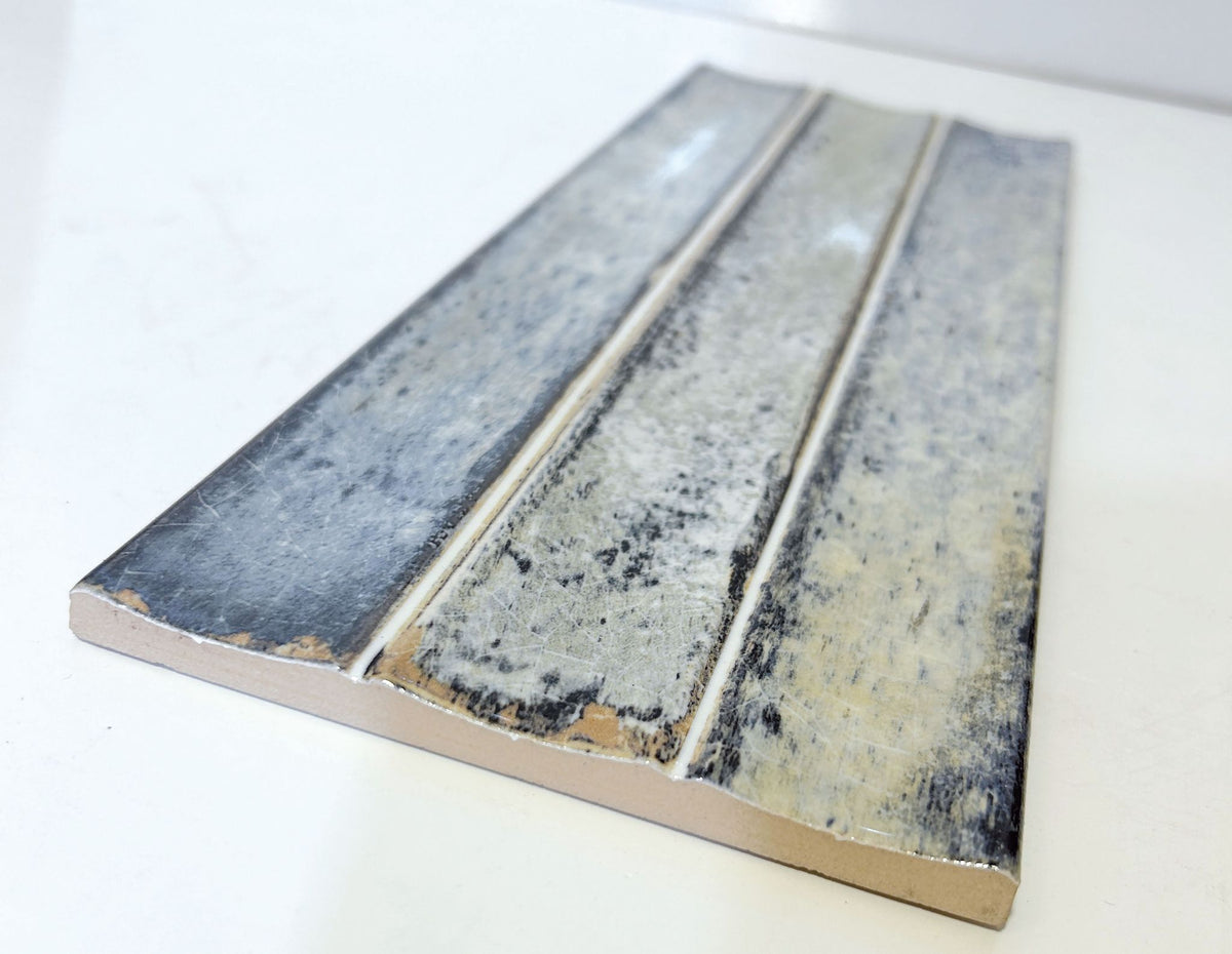 Delta Sky Glossy 5x13 ceramic tile, angled view of a single piece showing the glossy surface and edge
