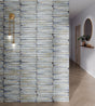 Delta Sky Glossy 5x13 ceramic tile shown in a hallway setting