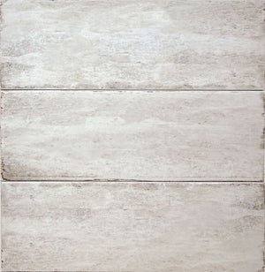 Delta Beige Glossy 5x13 ceramic tile, close-up of three pieces showing the glossy beige glaze