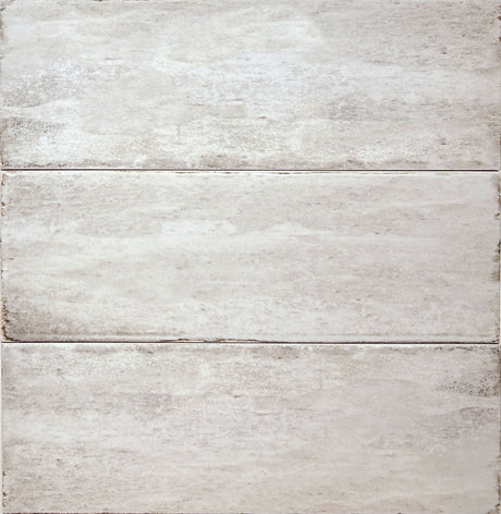 Delta Beige Glossy 5x13 ceramic tile, close-up of three pieces showing the glossy beige glaze
