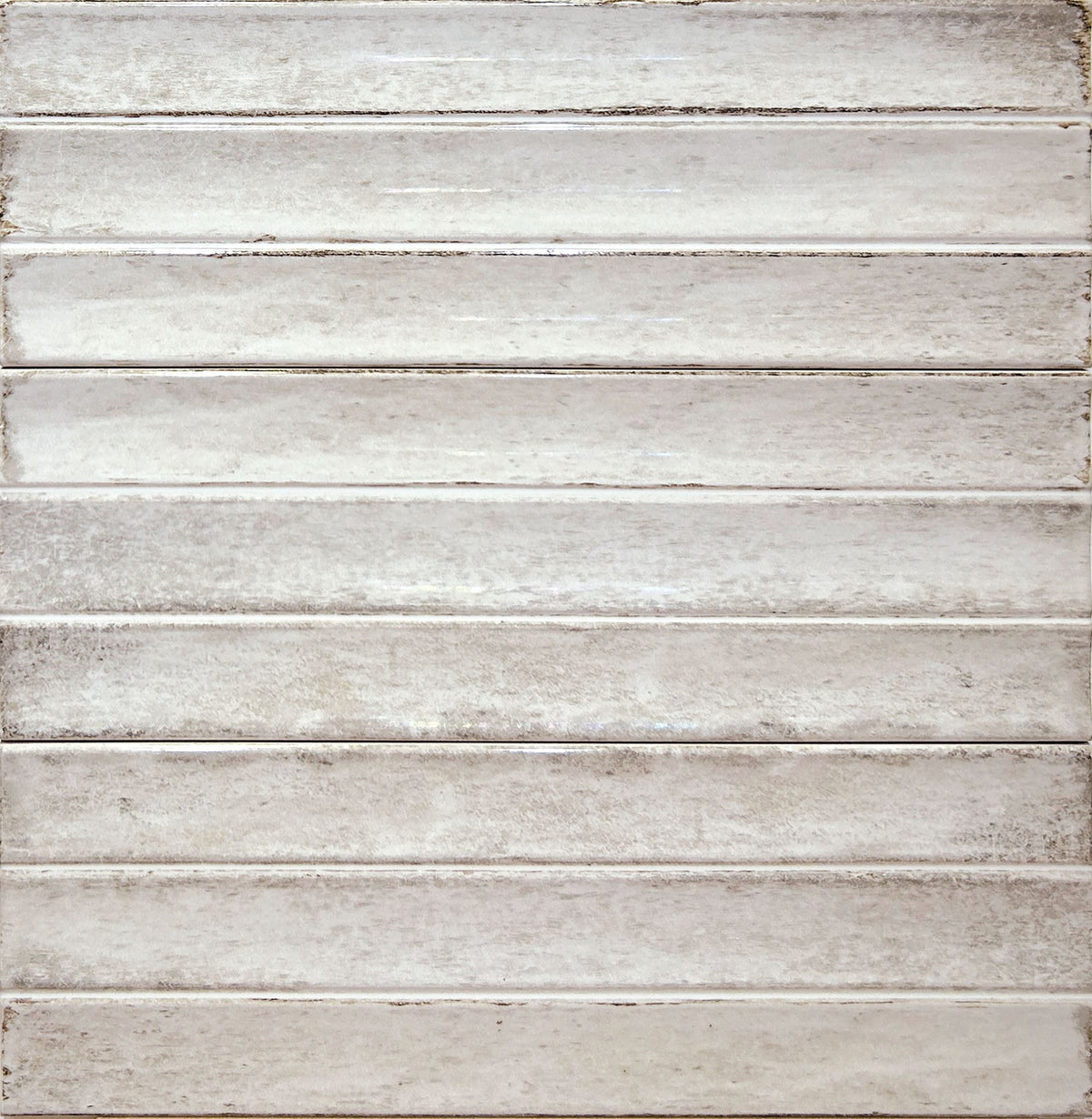 Delta Beige Glossy 5x13 ceramic tile shown in a multi-piece layout