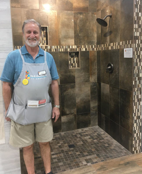 Dennis in front of his favorite Inspiration Area vignette, the hemisphere copper