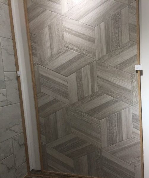 These diamond shape tiles below will create a giant hexagon in a wood plank tile design.